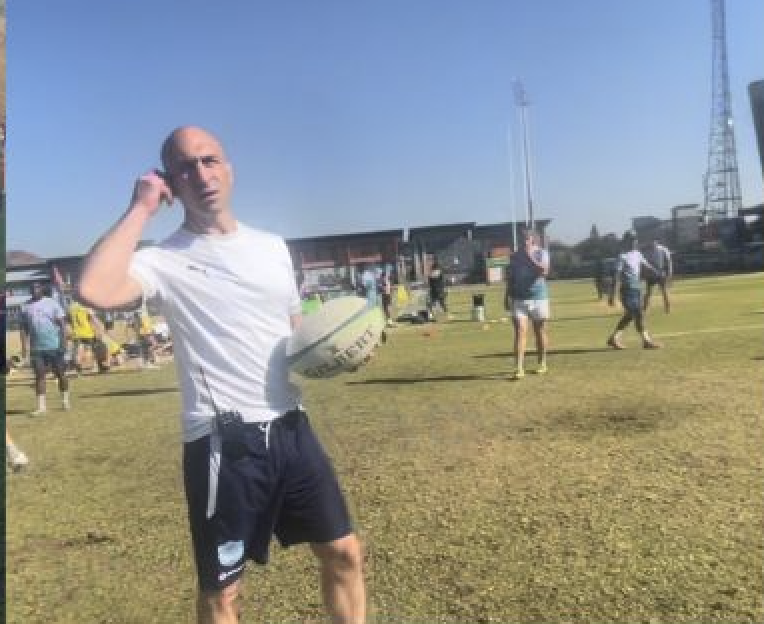 Ben mid-throw during a coaching session