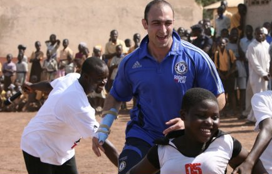 Ben coaching young players in Chelsea coaching kit
